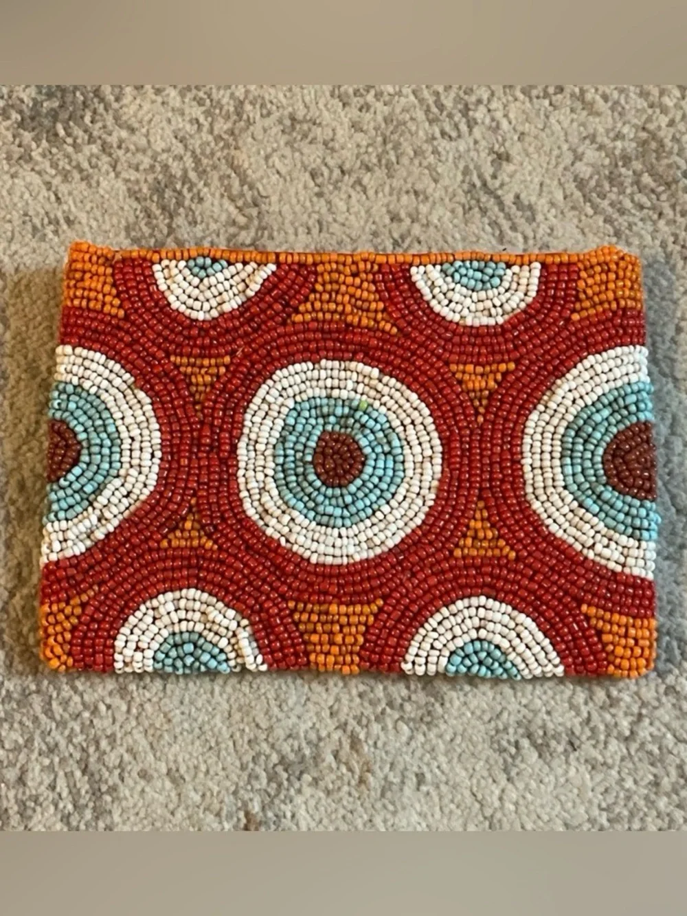 Small hand beaded clutch
